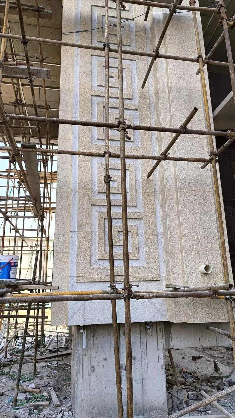 台州 黄金麻花岗岩别墅外墙干挂回纹造型效果